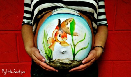 Cá trong nước - hình ảnh ẩn dụ em bé nằm trong bọc nước ối.